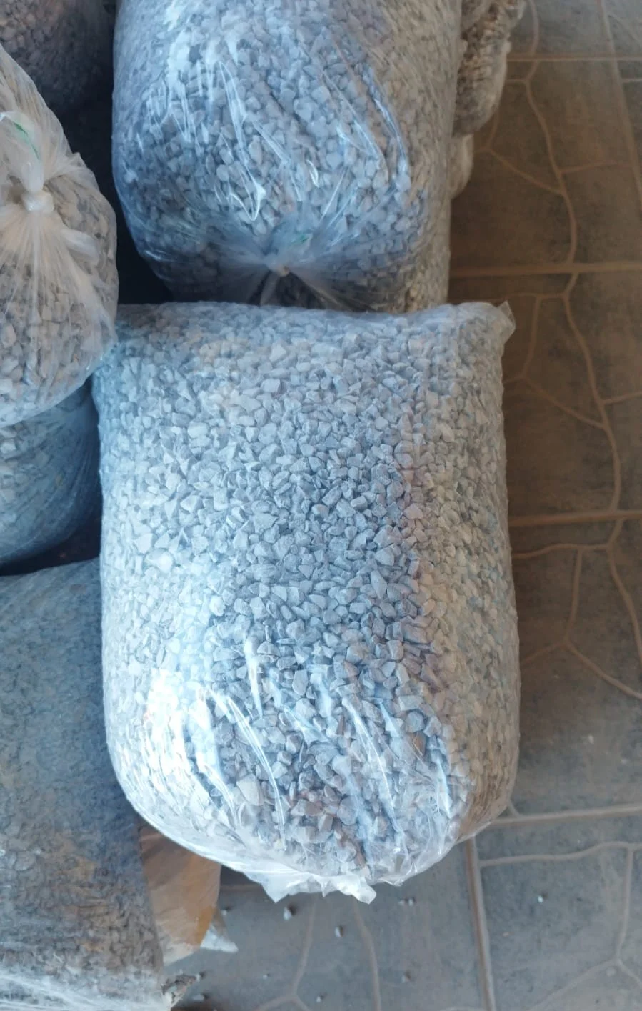 Granitina reciclada embalada em sacos para comercialização